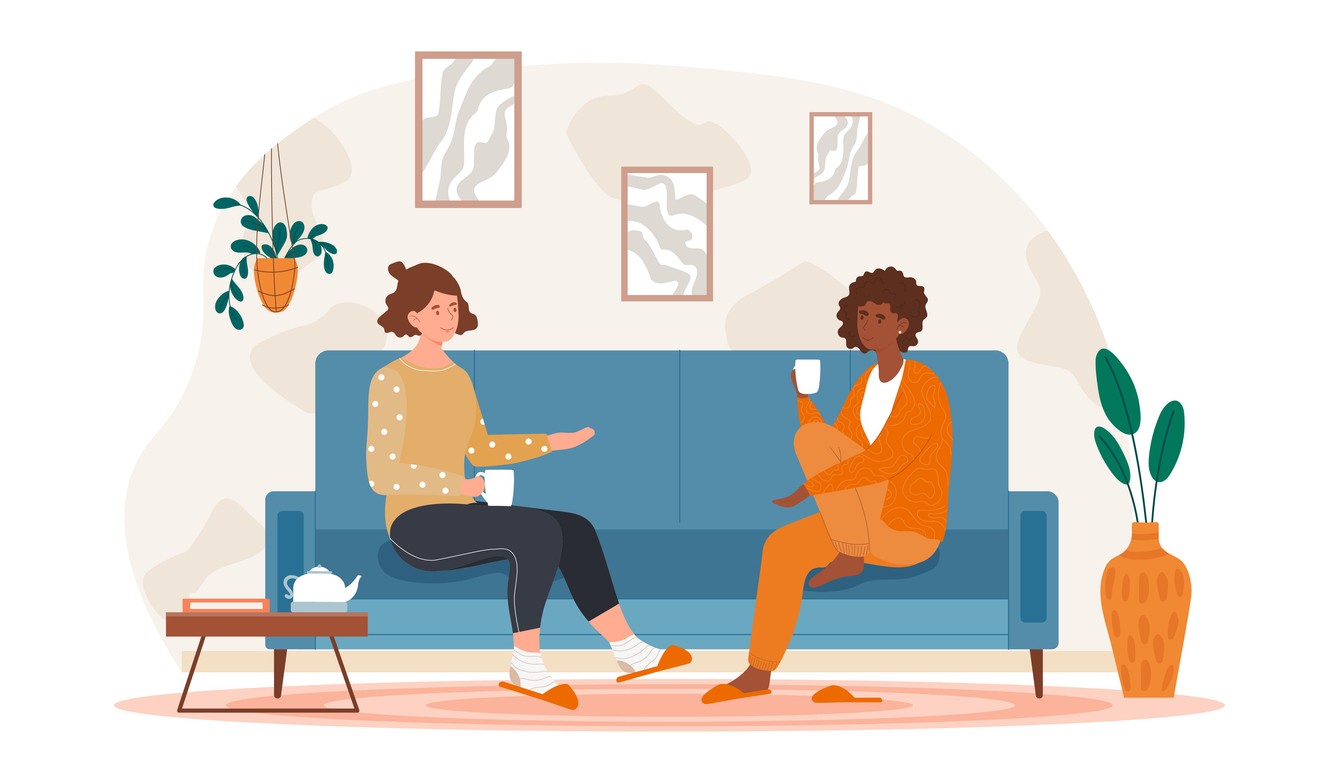 Two woman talking together about money